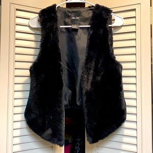 Black faux fur vest